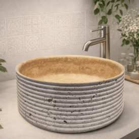 Lavabo Enol de piedra natural travertino redondo con acabado artesanal